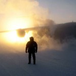 McChord Air Force Base crewmember in front of U.S. Air Force Base C-17A Globemaster jet out of McChord AFB, Washington at Pegasus Runway, McMurdo Station, Ross Island, Antarctica.