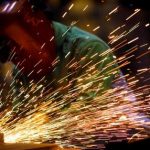 Worker making mine resistant vehicle in Ladson, S.C. Are tariffs another Trump bluff? Defense Dept. photo by Cherie A. Thurlby.