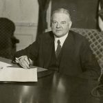 Herbert Hoover signs bill. Courtesy Herbert Hoover Presidential Library and Museum.