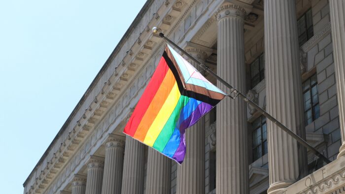 Pride Flag flying from Dept. of Commerce Building