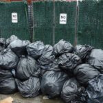 Pile of black garbage bags. Wikimedia Commons